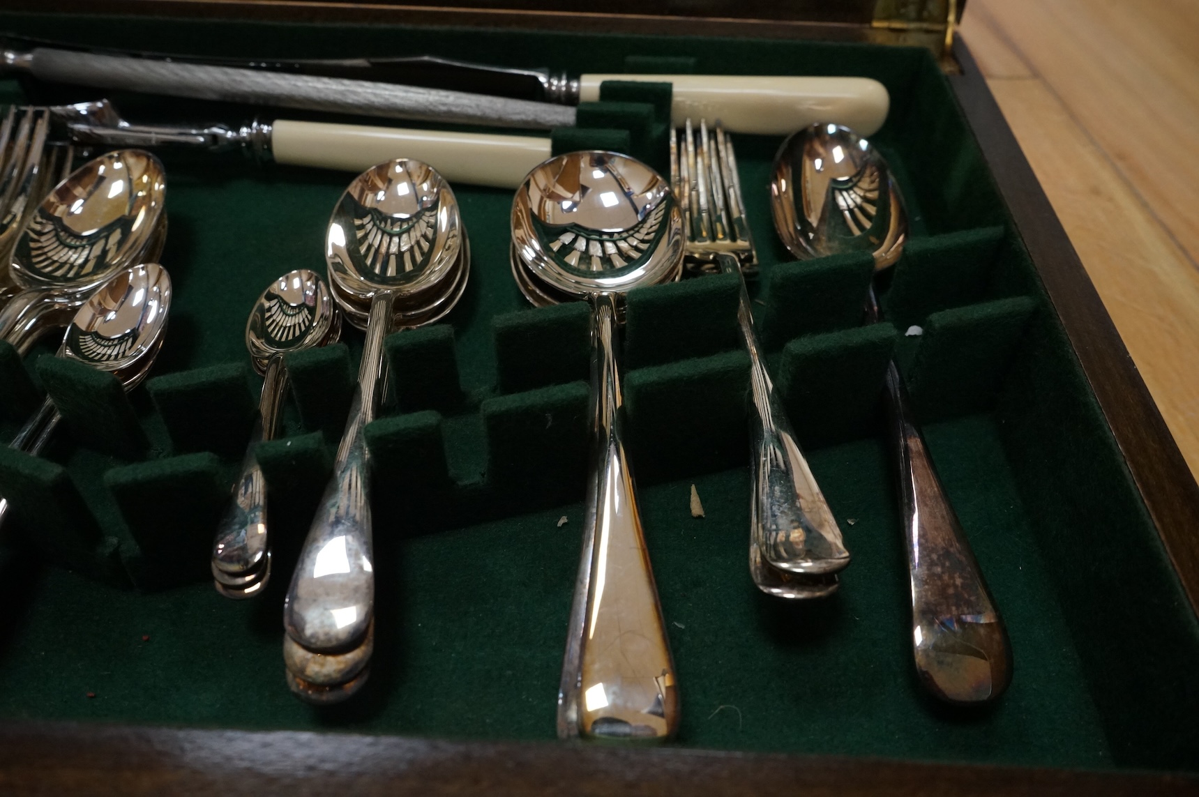 An oak canteen of silver plated cutlery